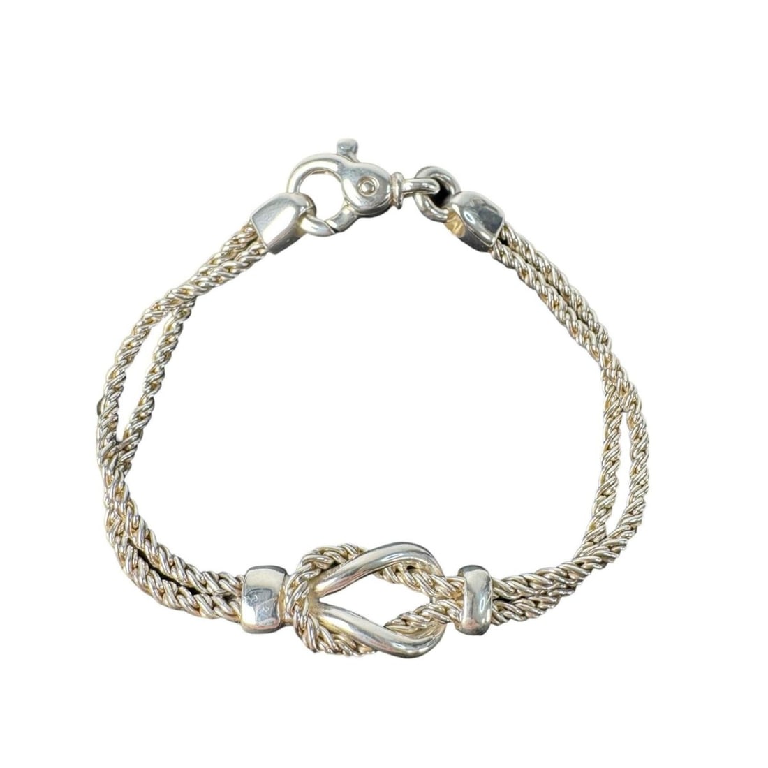 Tiffany & Co. Center Knot Double Rope Bracelet for Women: --- Catalog ---Category: SizeLength: 17cm / 6.69''Category: DesignType: Charm braceletColor: SilverGender: WomenMaterial: Silver 925Category: GeneralBrand: Tiffany--- Item List ---Section: ConditionRa