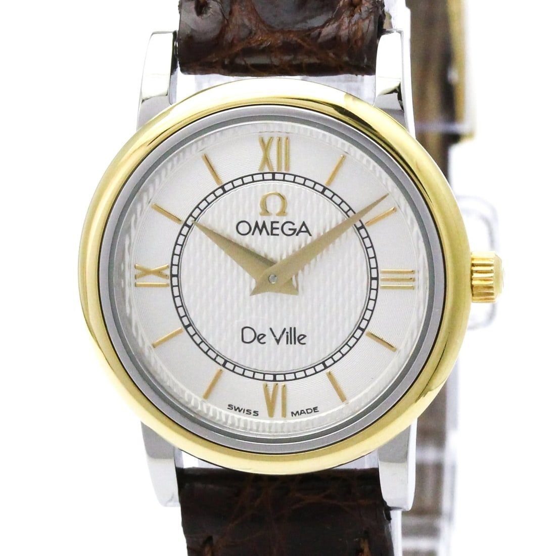 OMEGA De Ville Prestige 18K Gold Steel Ladies Watch 7774.31.12 Polished: --- Catalog ---Category: SizeCase Diameter: 23mm / 0.91''Category: DesignType: WristwatchStyle: Dress/FormalGender: WomenColor (Dial): SilverMaterial (Band): LeatherMaterial (Case): Gold plated, Stain