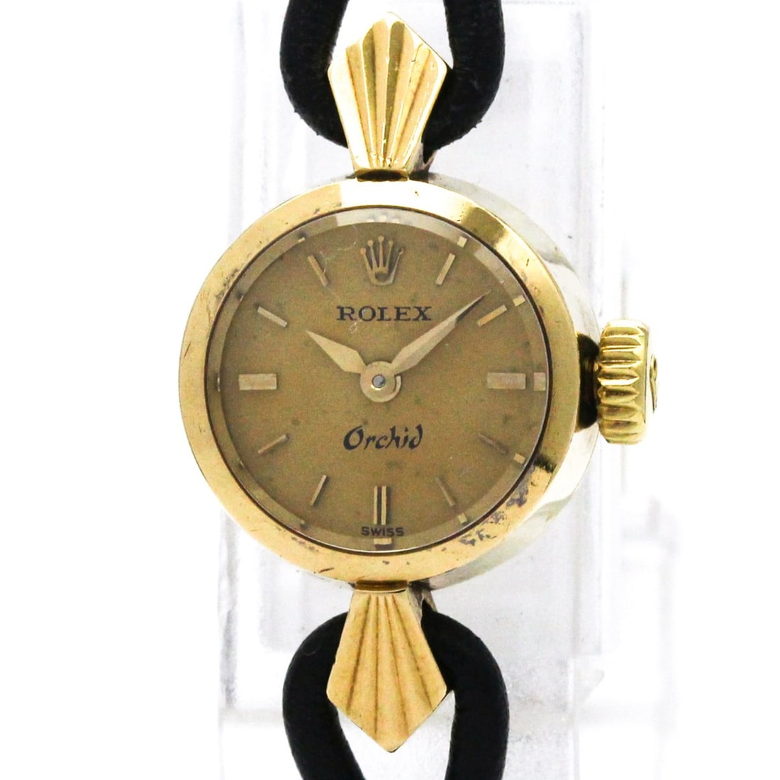 ROLEX Orchid 18K Gold Leather Mechanical Ladies Watch 6090A Vintage: --- Catalog ---Category: SizeCase Diameter: 15mm / 0.59''Category: DesignType: WristwatchStyle: Dress/FormalGender: WomenColor (Dial): GoldMaterial (Band): LeatherMaterial (Case): Yellow gold (18K)Cat