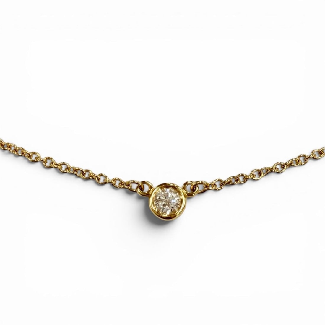 TIFFANY&Co. Tiffany By the Yard Elsa Peretti 750 (YG) Necklace with 1 Diamond (approx. 0.03ct, 3.4mm: --- Catalog ---Category: SizePendant Size: 3.4mm / 0.13''Neck Circumference: 40 cm / 15.74''Category: DesignColor: Yellow goldStone: DiamondGender: WomenMaterial: Yellow gold (18K)Weight (ct.): 0.03Ne