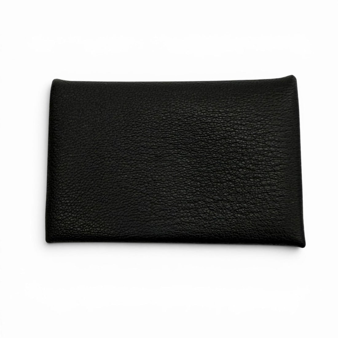 HERMES Calvi Chevre Mysore Silver Hardware Wallet/Coin Case/Card Case Black W Stamp Made in France: --- Catalog ---Category: DesignType: Card caseColor: BlackGender: MenMaterial: Chevre myzore leather Category: GeneralBrand: HermesCountry of Origin: FranceCategory: Physical PropertiesSize (HxWxD): 6