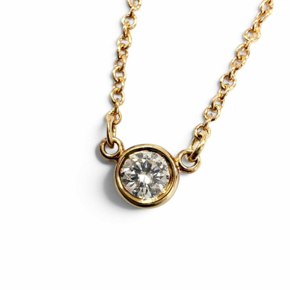 TIFFANY&Co. Tiffany & Co. Elsa Peretti By the Yard 1P Diamond Necklace 750 (YG) Approx. 0.05ct: --- Catalog ---Category: SizePendant Size: 3.77mm / 0.14''Neck Circumference: 41 cm / 16.14''Category: DesignColor: Yellow goldStone: DiamondGender: WomenMaterial: Yellow gold (18K)Necklace Type: Neck