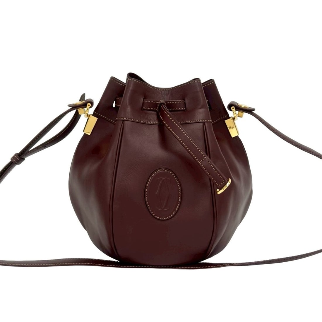 CARTIER Vintage Must Line Leather Drawstring Shoulder Bag/Pochette, Bordeaux, 64951: --- Catalog ---Category: SizeSize (HxWxD): 23cm x 16.5cm x 16.5cm / 9.05'' x 6.49'' x 6.49''Category: DesignType: Pochette, Shoulder bagColor: Wine redGender: WomenMaterial: Leather Category: GeneralB
