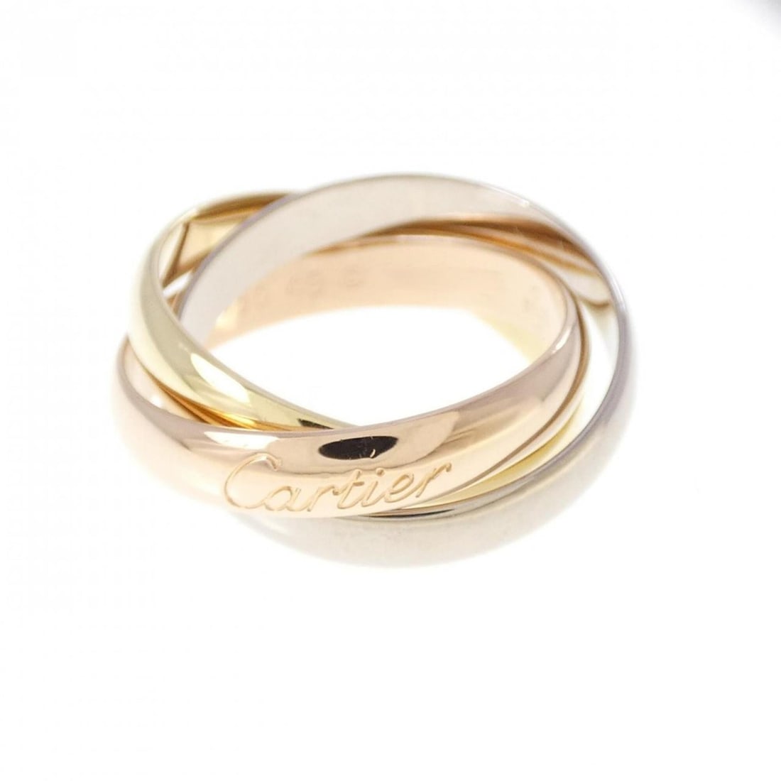 Cartier Trinity Ring: --- Catalog ---Category: SizeUS Size: 5Brand Size: 49Category: DesignType: Band ringGender: WomenMaterial: Pink gold (18K), White gold (18K), Yellow gold (18K)Category: GeneralMPN: B4052700Brand: Cart