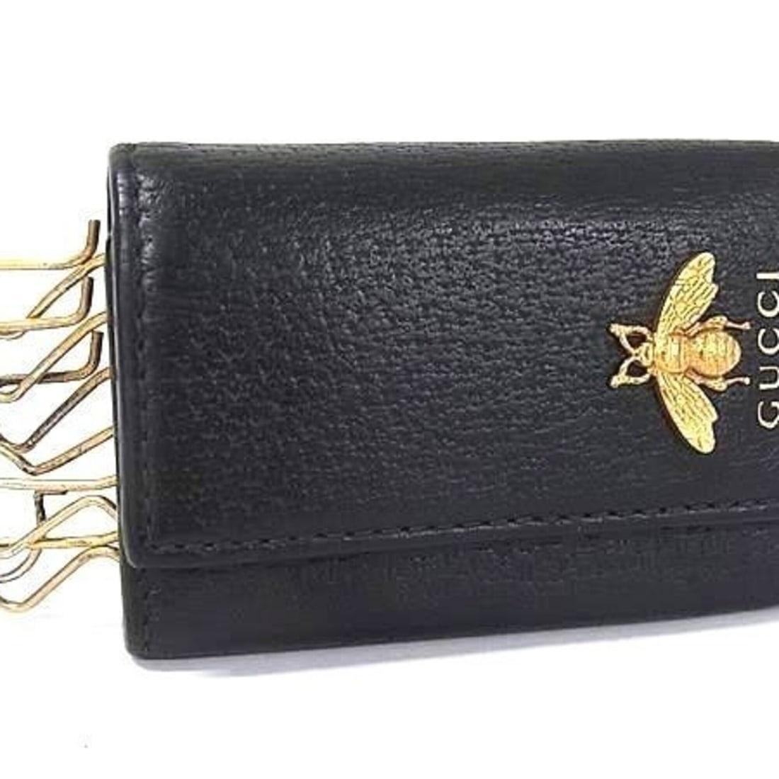 GUCCI Animalier Key Case 523633 Black Leather Men's and Women's Bee: --- Catalog ---Category: DesignType: KeycaseColor: BlackGender: Men,WomenMaterial: Leather Category: GeneralMPN: 523633Brand: GucciCountry of Origin: ItalyCategory: Physical PropertiesSize (HxWxD): 9.