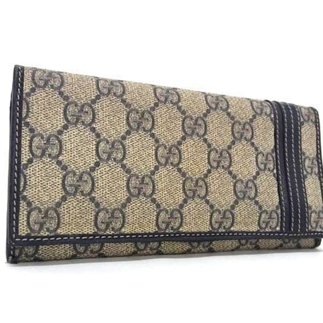 GUCCI GG Supreme 212186 Brown x Navy Leather Men's Bi-fold Wallet: --- Catalog ---Category: SizeSize (HxWxD): 9.2cm x 18cm x 1cm / 3.62'' x 7.08'' x 0.39''Category: DesignType: Long wallet (bi-fold)Color: Brown, NavyGender: Men,WomenMaterial: GG Supreme , Leather Cat