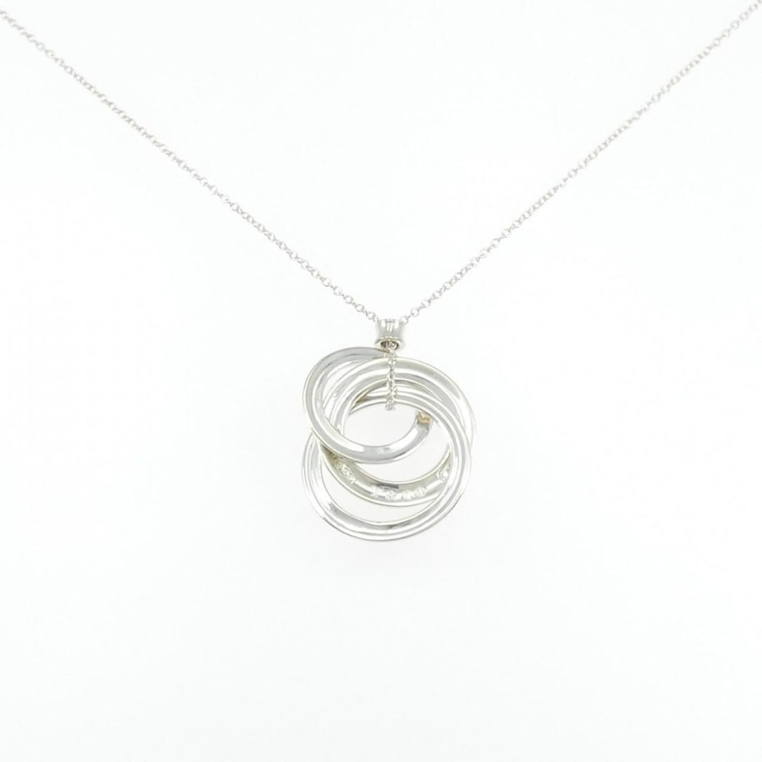 Tiffany & Co. 1837 Interlocking Circle Small Necklace: --- Catalog ---Category: SizePendant Size: 24.7mm x 22.5mm / 0.97'' x 0.88''Neck Circumference: 44 cm / 17.32''Category: DesignColor: SilverGender: WomenMaterial: Silver 925Pendant Type: