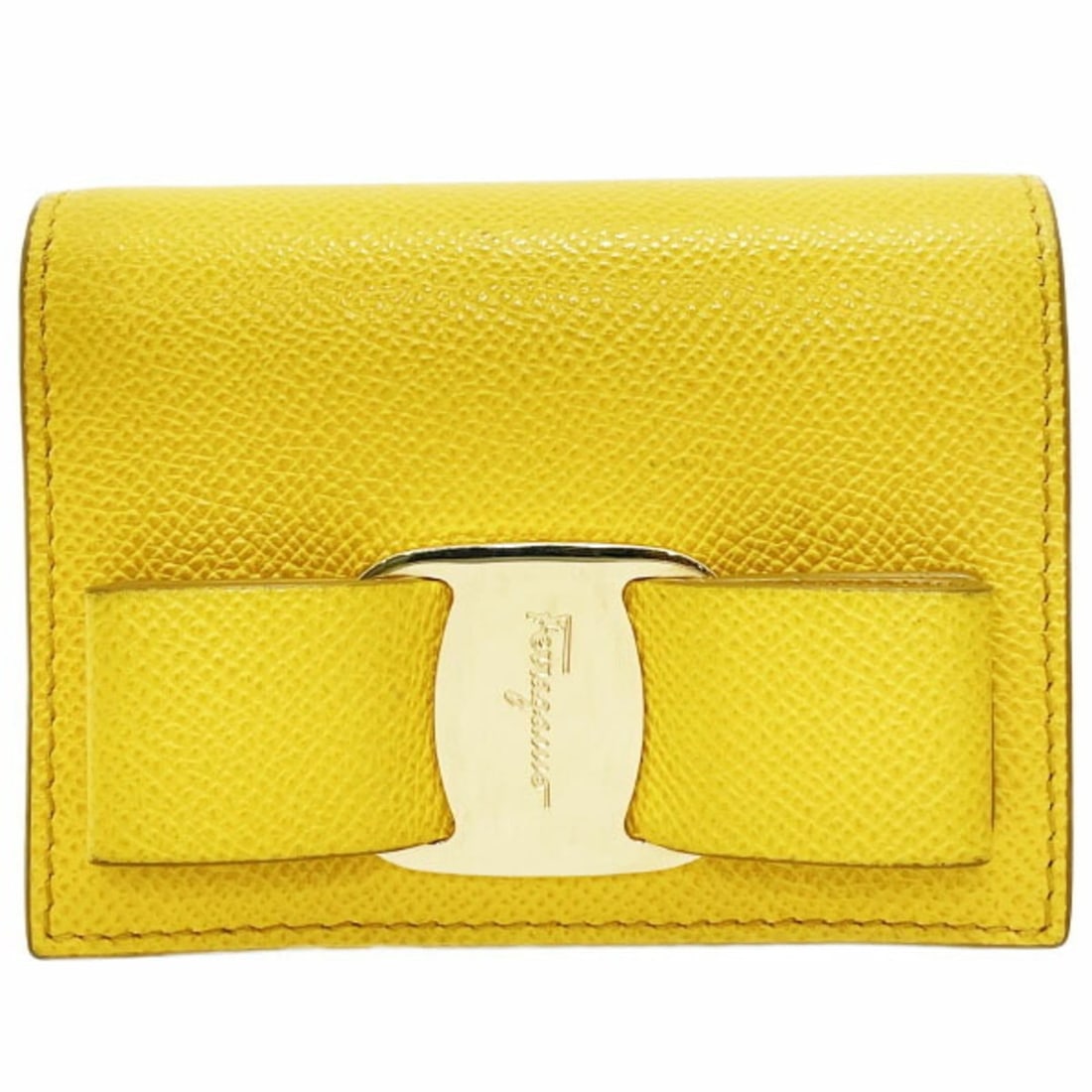 Salvatore Ferragamo Vara Bi-fold Wallet, Leather, Yellow, Size 22 D515, Ribbon, Compact, VARA: --- Catalog ---Category: SizeSize (HxWxD): 8cm x 10.8cm x 3cm / 3.14'' x 4.25'' x 1.18''Category: DesignType: Wallet (bi-fold)Color: YellowGender: WomenMaterial: Leather Category: GeneralLine: VaraBra
