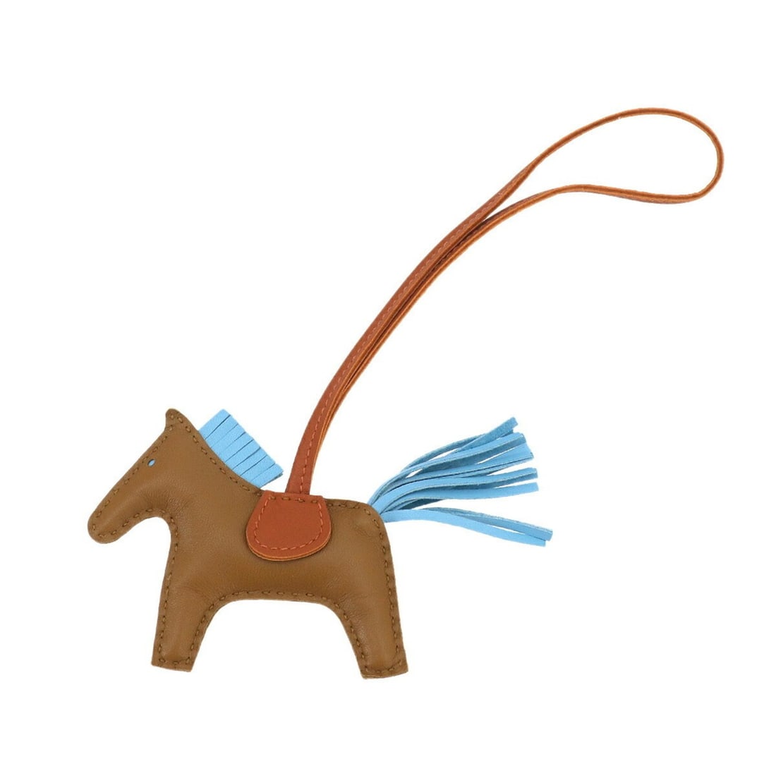 Hermes Rodeo PM Bag Charm - Agneau Milo Craft Celeste Pain d'épices D Stamp: --- Catalog ---Category: SizeSize (HxWxD): 70.00mm x 120.00mm / 2.76'' x 4.72''Category: DesignType: Handbag charmColor: KraftGender: Men,WomenMaterial: Agneau MiloCategory: GeneralBrand: