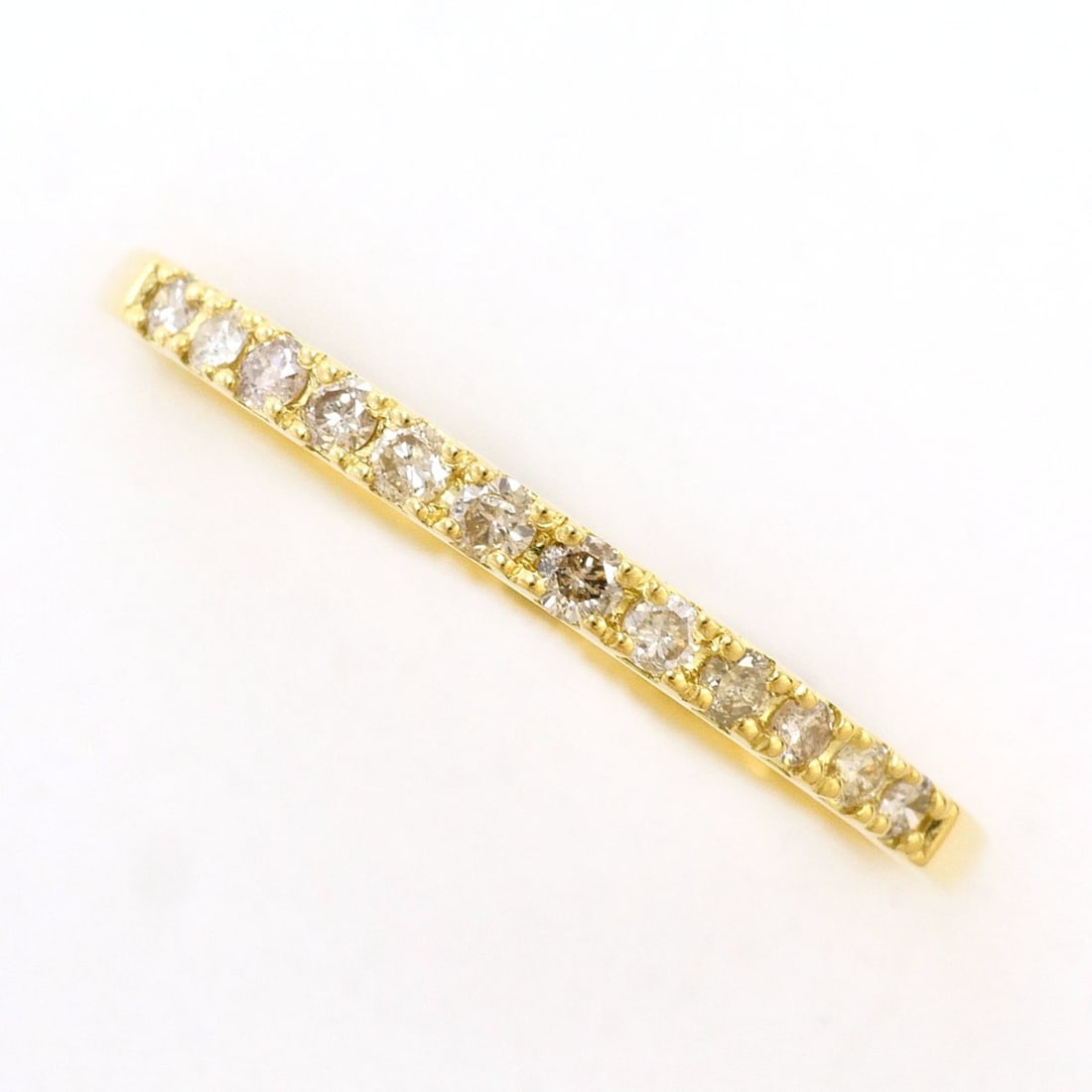 18K (18-karat) Yellow Gold Ring with 0.15ct Diamond, Total Weight 0.9g, Like New Condition.: --- Catalog ---Category: SizeWidth: 2mm / 0.08''Weight: 0.9g / 0.03oz.JP Size: 15US Size: 7.5Category: DesignType: Band ringColor: Yellow goldMetal: GoldStone: DiamondGender: WomenMaterial: Yellow gol