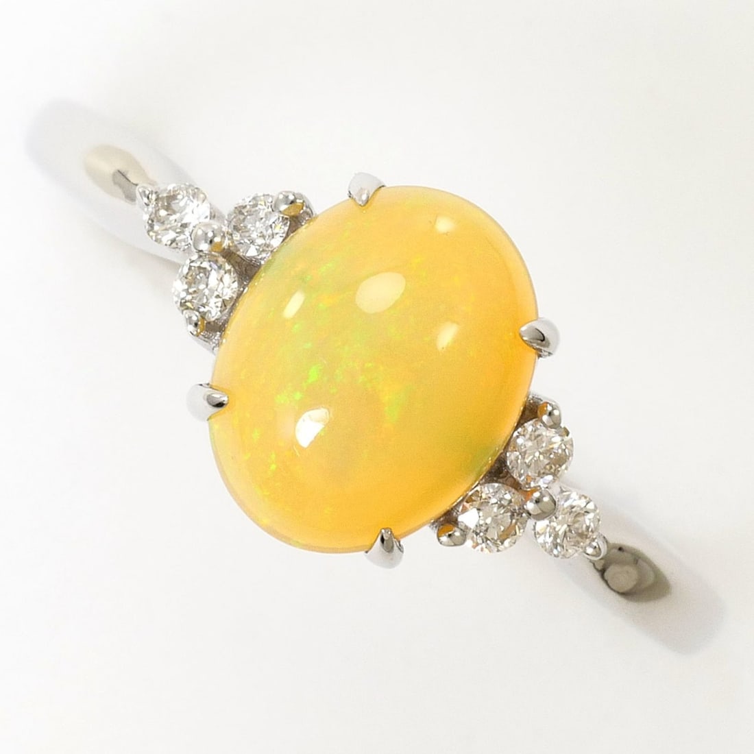 18K (18-karat white gold) ring, size 1, with 1.00ct opal and 0.10ct diamonds, total weight 2.5g, (1 of 10)