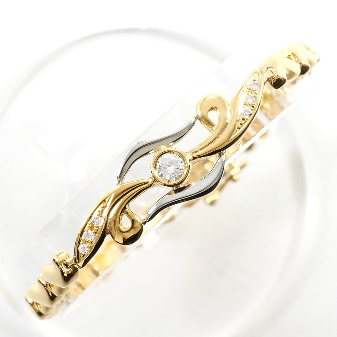 PT850 Platinum 18K Yellow Gold Bracelet with 0.19ct Diamond, Certificate of Authenticity, Total: --- Catalog ---Category: SizeLength: 17.5cm / 6.88''Weight: 13.7g / 0.48oz.Category: DesignType: Charm braceletColor: Yellow goldMetal: Gold, PlatinumStone: DiamondGender: WomenMaterial: Platinum 850,