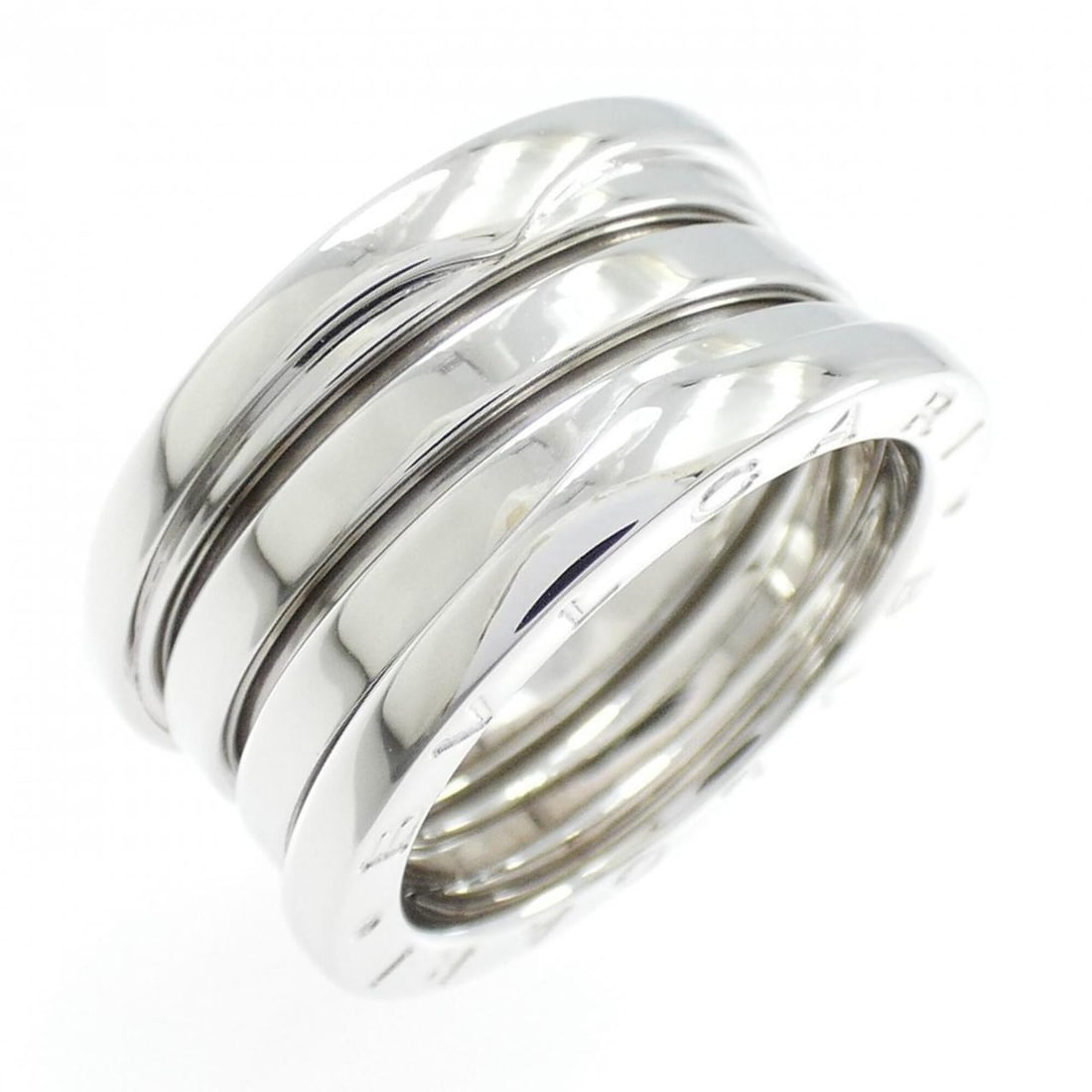 Bvlgari B.zero1 4-band ring: --- Catalog ---Category: SizeUS Size: 6Brand Size: 52Category: DesignType: Band ringGender: WomenMaterial: White gold (18K)Category: GeneralBrand: Bvlgari--- Item List ---Section: ConditionRanking: Ra