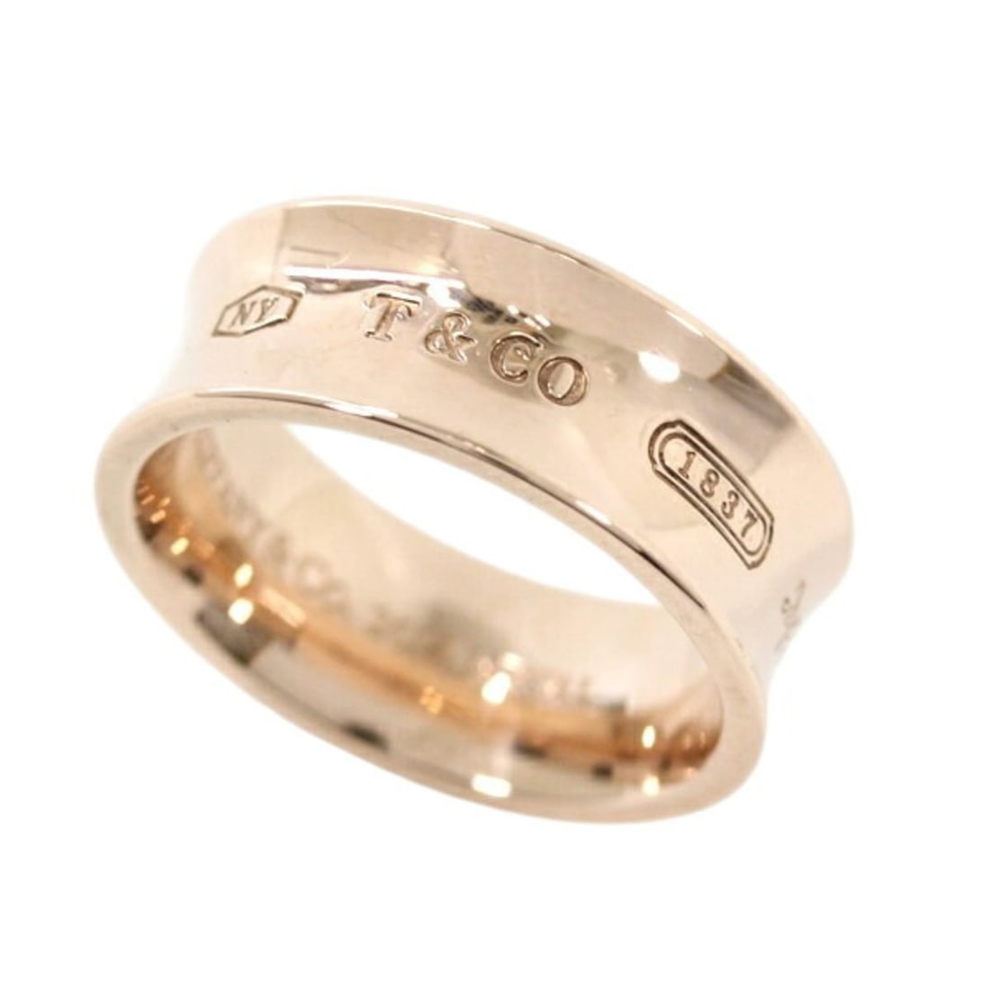 Tiffany & Co. 1837 Rubedo Metal Ring, Size 9, Pink Gold, TK2378 (Women's/Men's): --- Catalog ---Category: SizeWidth: 7mm / 0.28''JP Size: 9US Size: 5Category: DesignType: Band ringColor: Pink, Rose goldGender: Men,WomenMaterial: MetalCategory: GeneralBrand: Tiffany--- Item List