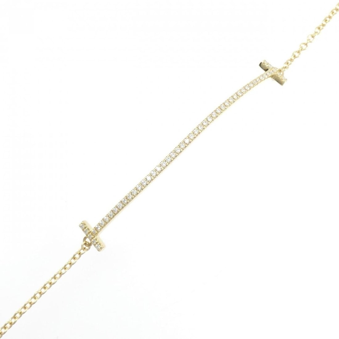 Tiffany T Smile Bracelet: --- Catalog ---Category: SizeLength: 16.5cm / 6.49''Total Length: 16.5cm / 6.49''Category: DesignType: Charm braceletColor: Yellow goldStone: DiamondGender: WomenMaterial: Yellow gold (18K)Category:
