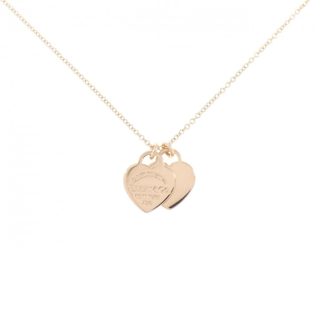 Tiffany & Co. Return to Double Heart Necklace: --- Catalog ---Category: SizePendant Size: 13.6mm x 12.6mm / 0.53'' x 0.49''Neck Circumference: 41 cm / 16.14''Category: DesignColor: Pink goldGender: WomenMaterial: Pink gold (18K)Pendant Type: