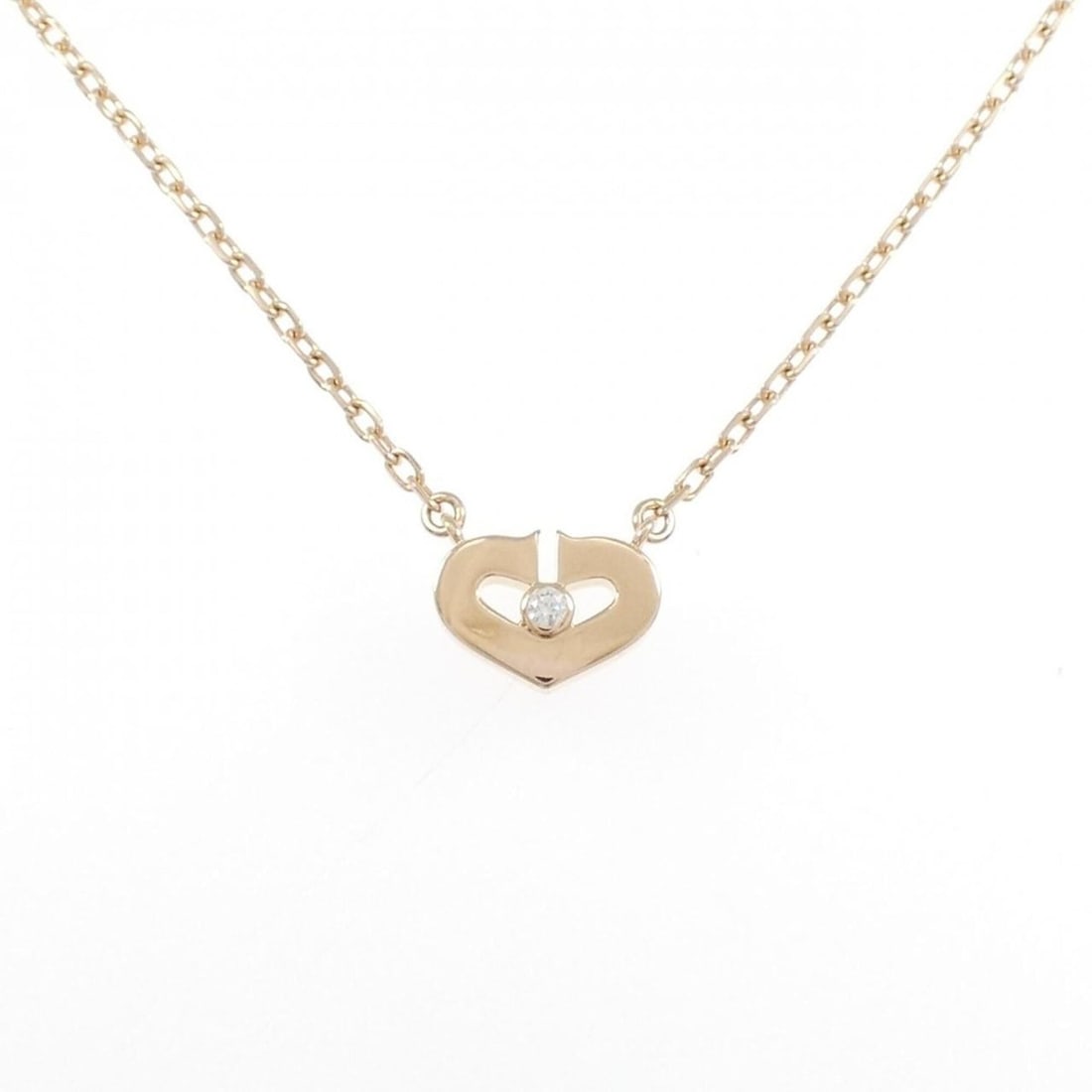 Cartier C Heart Small Necklace: --- Catalog ---Category: SizePendant Size: 7.1mm x 9.9mm / 0.27'' x 0.38''Neck Circumference: 39 cm / 15.35''Category: DesignGender: WomenMaterial: Pink gold (18K)Pendant Type: PendantNecklace Type: