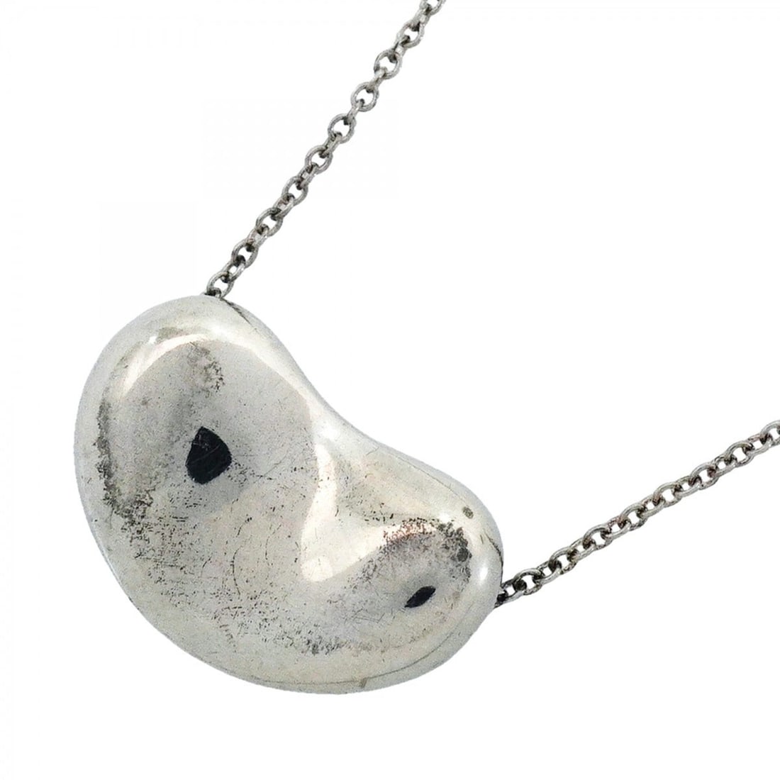 Tiffany & Co. Bean Necklace, Sterling Silver 925, Women's: --- Catalog ---Category: SizePendant Size: 12mm x 19.1mm / 0.47'' x 0.75''Neck Circumference: 41.5 cm / 16.33''Category: DesignGender: WomenMaterial: Silver 925Necklace Type: NecklaceCategory: General