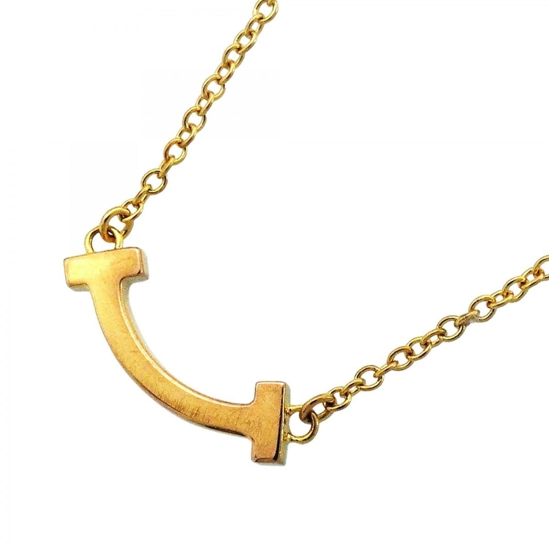 Tiffany & Co. T Smile Mini Necklace, 18K Yellow Gold, Women's: --- Catalog ---Category: SizePendant Size: 4.6mm x 13.9mm / 0.18'' x 0.54''Neck Circumference: 40.5 cm - 45.5 cm / 15.94'' - 17.91''Category: DesignGender: WomenMaterial: Yellow gold (18K)Necklace Typ