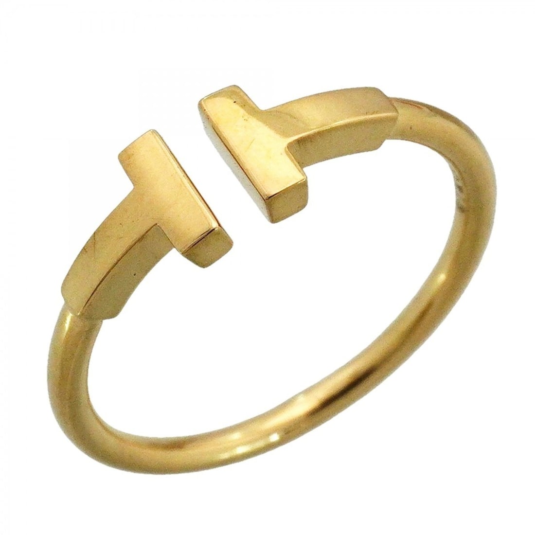 Tiffany & Co. T-Wire Ring, 18K Yellow Gold, Size 16.5 (Men's): --- Catalog ---Category: SizeJP Size: 16.5US Size: 8Category: DesignType: Band ringGender: MenMaterial: Yellow gold (18K)Category: GeneralBrand: Tiffany--- Item List ---Section: ConditionRanking: Rank