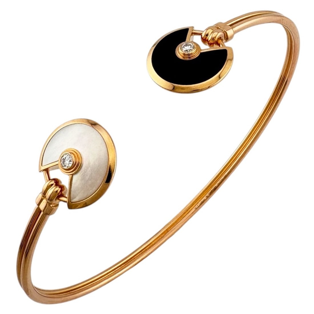 Cartier Amulet Bangle, 18K Pink Gold, Onyx, Mother-of-Pearl, Women's, CARTIER: --- Catalog ---Category: PackNumber in Pack: 1Category: SizeLength: 15cm / 5.9''Category: DesignType: BangleColor: Pink goldGender: WomenMaterial: Pink gold (18K)Category: GeneralBrand: Cartier--- Ite