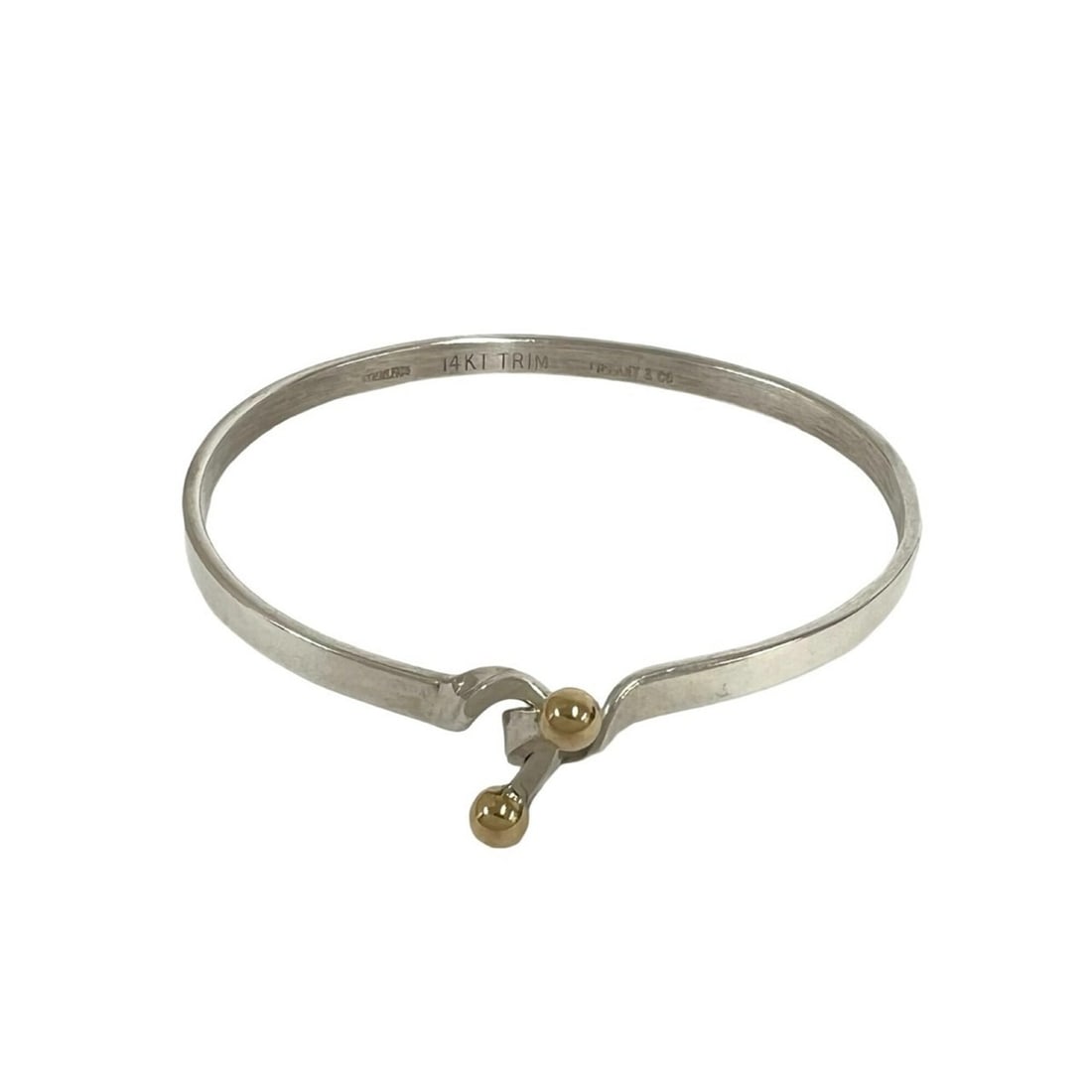 TIFFANY&Co. Tiffany Double Hook Bangle, Sterling Silver 925, 18K Yellow Gold Bracelet, 00599: --- Catalog ---Category: SizeLength: 16cm / 6.29''Category: DesignType: BangleColor: Gold, SilverGender: WomenMaterial: Silver 925, Yellow gold (18K)Category: GeneralBrand: Tiffany--- Item List