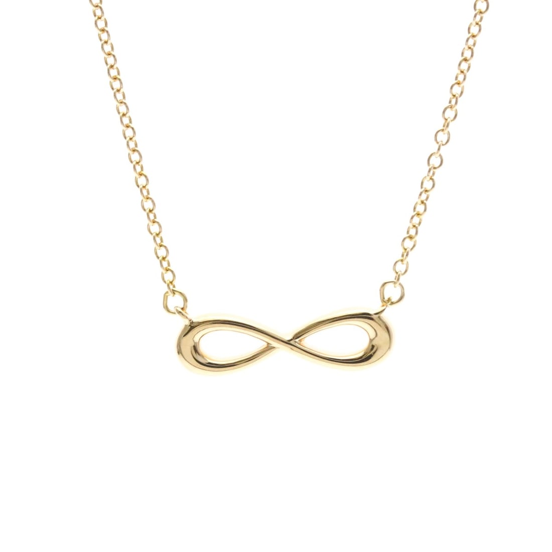 Tiffany Infinity Necklace Pink Gold (18K) No Stone Men,Women Fashion Pendant Necklace (Pink Gold): --- Catalog ---Category: SizeWeight: 2g / 0.07oz.Pendant Size: 4.2mm x 14.5mm / 0.16'' x 0.57''Neck Circumference: 41 cm - 44 cm / 16.14'' - 17.32''Category: DesignColor: Pink goldMetal: GoldStone: No