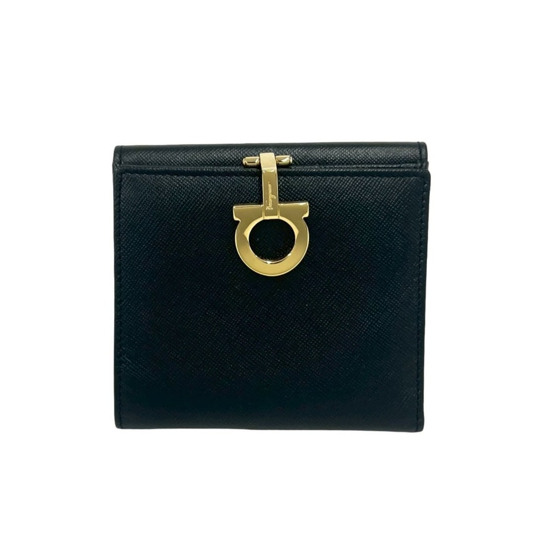 Salvatore Ferragamo Vintage Gancini Hardware Leather Bi-fold Wallet Black 92133: --- Catalog ---Category: SizeSize (HxWxD): 10cm x 10.5cm x 1.5cm / 3.93'' x 4.13'' x 0.59''Category: DesignType: Wallet (bi-fold)Color: BlackGender: WomenMaterial: Leather Category: GeneralBrand: Salv