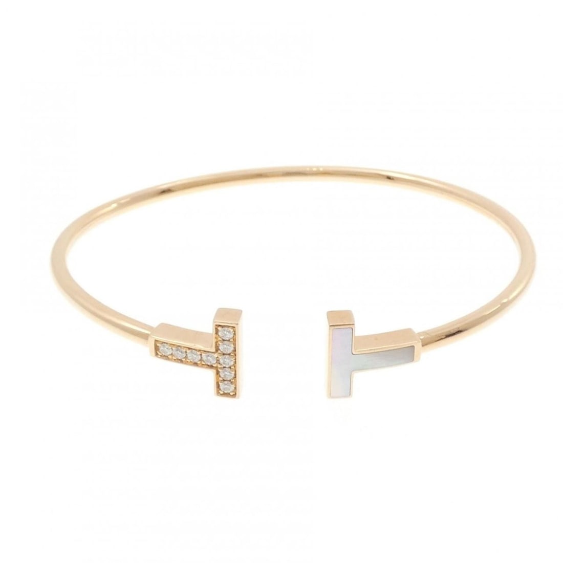 Tiffany T Wire Bangle: --- Catalog ---Category: SizeLength: 16.5cm / 6.49''Category: DesignType: BangleStone: DiamondGender: WomenMaterial: Pink gold (18K)Category: GeneralBrand: Tiffany--- Item List ---Section: