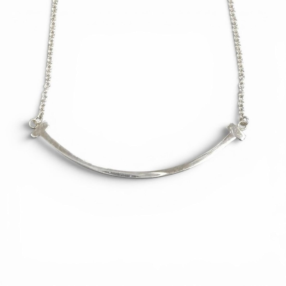 TIFFANY&Co. Tiffany T Smile Pendant Small AG925 Necklace Silver Weight 2.0g Women's: --- Catalog ---Category: SizePendant Size: 3mm x 37mm / 0.11'' x 1.45''Neck Circumference: 40.5 cm - 45.5 cm / 15.94'' - 17.91''Category: DesignColor: SilverGender: WomenMaterial: Silver 925Necklace T
