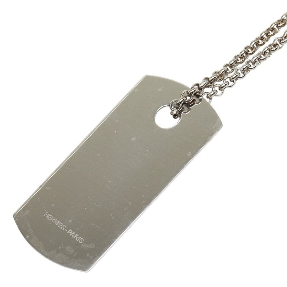Hermes Dog Tag Necklace, Silver Metal, Women's: --- Catalog ---Category: SizePendant Size: 69.4mm x 33.9mm / 2.73'' x 1.33''Neck Circumference: 84 cm / 33.07''Category: DesignColor: SilverGender: WomenMaterial: MetalNecklace Type: NecklaceCategory: