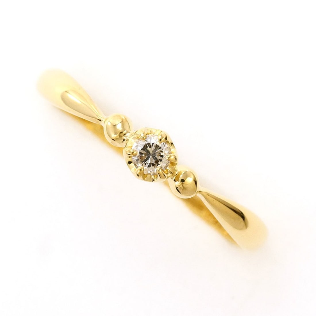 18K (18-karat) Yellow Gold Ring with 0.07ct Diamond, Total Weight 1.1g, Like New Condition.: --- Catalog ---Category: SizeWidth: 3.5mm / 0.14''Weight: 1.1g / 0.03oz.JP Size: 12.5US Size: 6.5Category: DesignType: Band ringColor: Yellow goldMetal: GoldStone: DiamondGender: WomenMaterial: Yellow