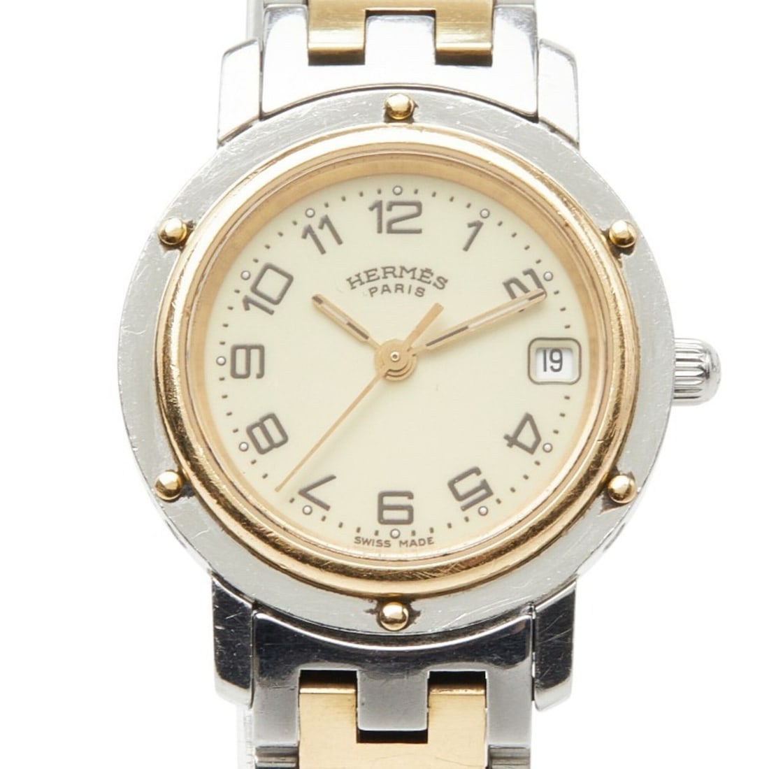 Hermes Clipper Combination Ivory Watch CL4.220 Quartz Beige Dial Stainless Steel Plated Women's: --- Catalog ---Category: SizeWrist Size: 15.5cm / 6.1''Case Diameter: 24mm / 0.94''Category: DesignType: WristwatchGender: WomenColor (Dial): BeigeMaterial (Band): Gold plated, Stainless steelMaterial