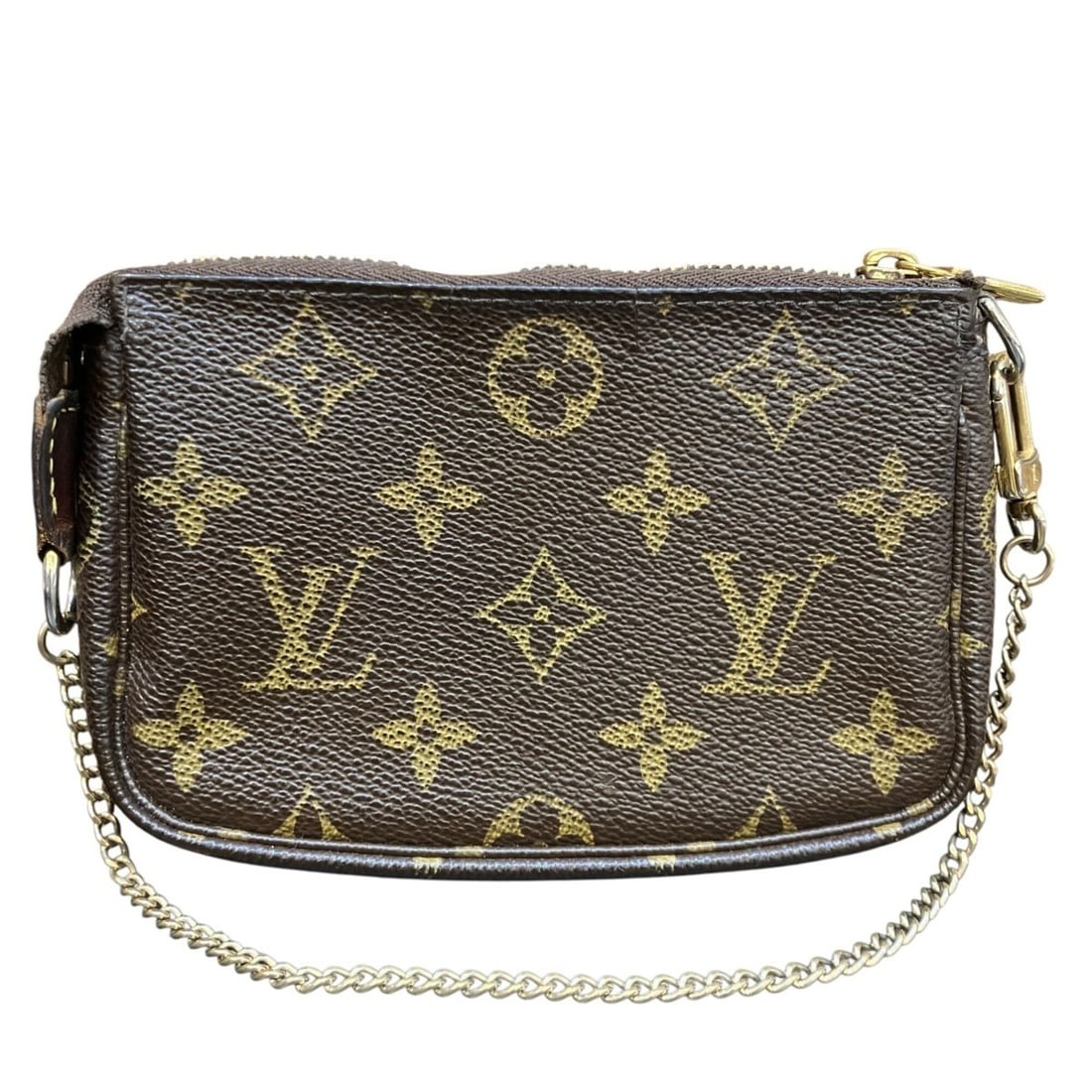 Louis Vuitton Mini Pochette Accessoires Monogram Canvas M58009: --- Catalog ---Category: SizeSize (HxWxD): 10cm x 15.5cm x 3cm / 3.93'' x 6.1'' x 1.18''Category: DesignType: PochetteColor: Brown, MonogramGender: WomenMaterial: Monogram Category: GeneralMPN: M58009