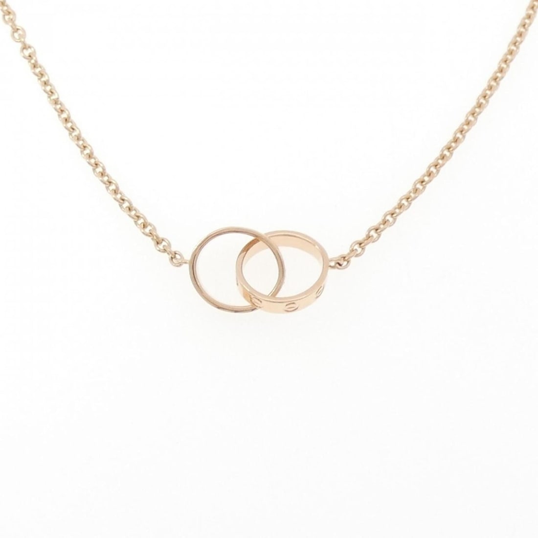 Cartier Baby Love Necklace: --- Catalog ---Category: SizeWidth: 1.9mm / 0.07''Weight: 7.1g / 0.25oz.Pendant Size: 10mm / 0.39''Neck Circumference: 44 cm / 17.32''Category: DesignGender: WomenMaterial: Pink gold (18K)Necklace