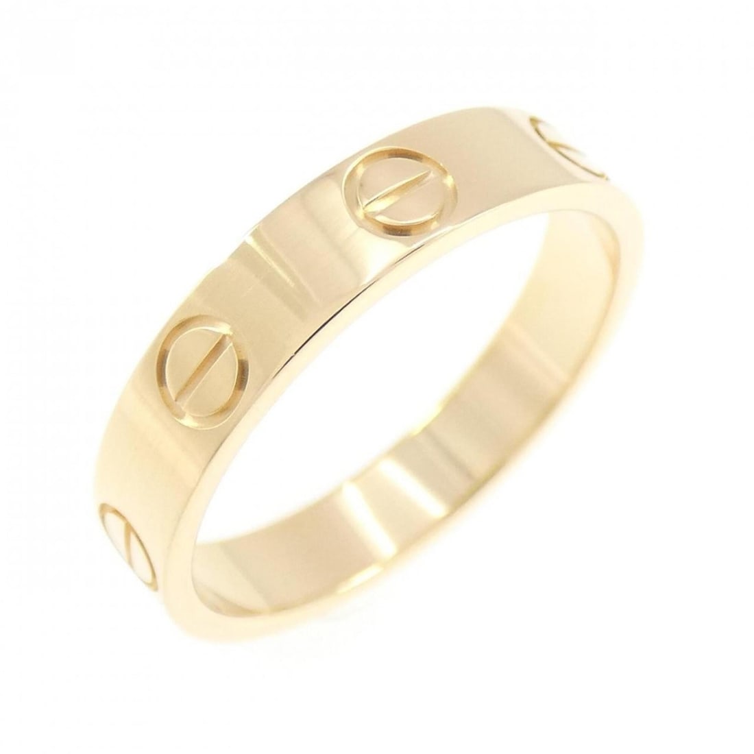Cartier Mini Love Ring: --- Catalog ---Category: SizeWidth: 3.5mm / 0.14''Weight: 3.1g / 0.1oz.JP Size: 10US Size: 5.5Category: DesignType: Band ringGender: WomenMaterial: Yellow gold (18K)Category: GeneralLine: LoveBrand: