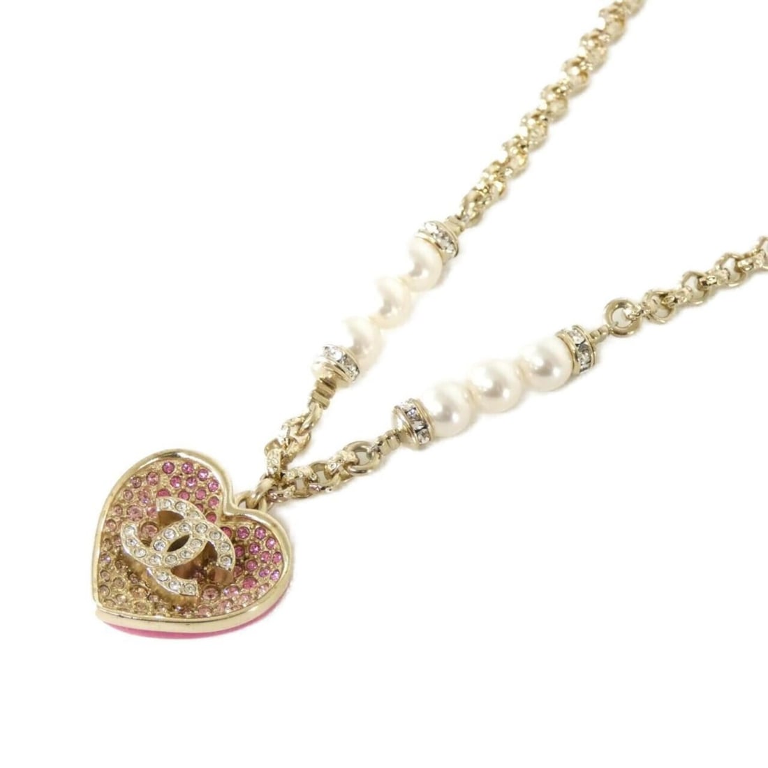 Chanel ABA395 Necklace: --- Catalog ---Category: SizePendant Size: 22mm x 21mm / 0.86'' x 0.82''Neck Circumference: 44 cm - 50 cm / 17.32'' - 19.68''Category: DesignColor: Pink, WhiteStone: Artificial pearl, CrystalGender: