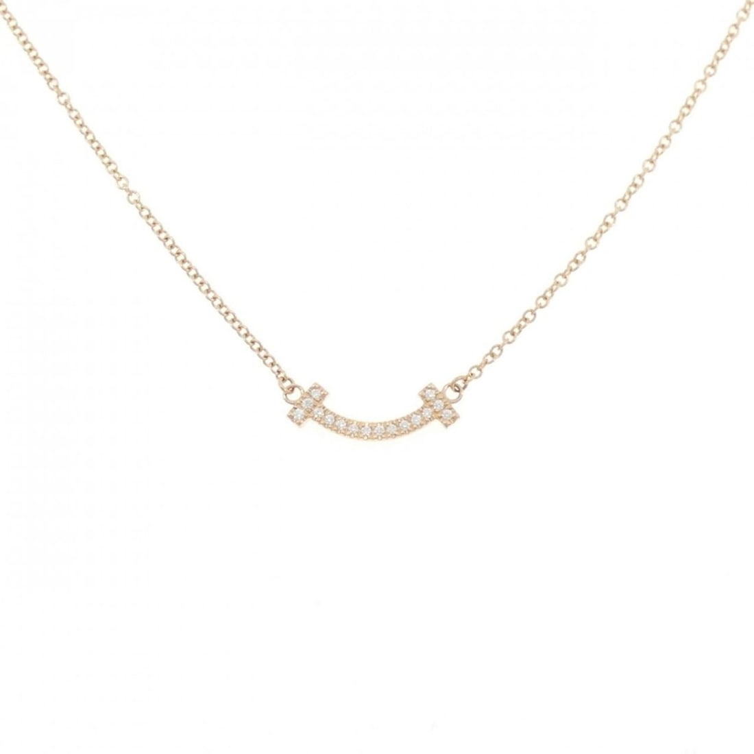 Tiffany T Smile Mini Necklace: --- Catalog ---Category: SizePendant Size: 3.7mm x 13.8mm / 0.14'' x 0.54''Neck Circumference: 41 cm - 46 cm / 16.14'' - 18.11''Category: DesignColor: Pink goldStone: DiamondGender: WomenMaterial: