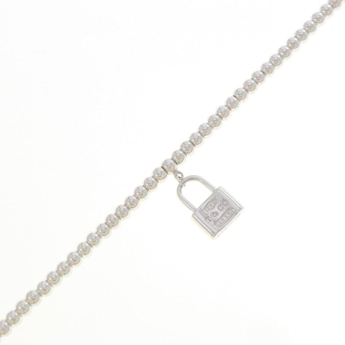 Tiffany 1837 Bracelet: --- Catalog ---Category: SizeLength: 17cm / 6.69''Category: DesignType: Charm braceletColor: SilverGender: WomenMaterial: Silver 925Category: GeneralBrand: Tiffany--- Item List ---Section:
