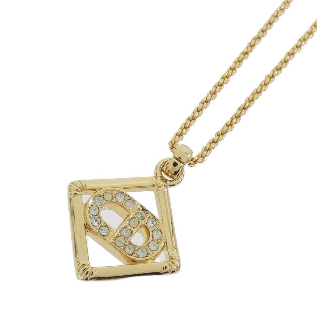 Christian Dior necklace: --- Catalog ---Category: SizePendant Size: 20mm x 20mm / 0.78'' x 0.78''Neck Circumference: 39 cm - 44.5 cm / 15.35'' - 17.51''Category: DesignColor: Clear, GoldGender: WomenNecklace Type: