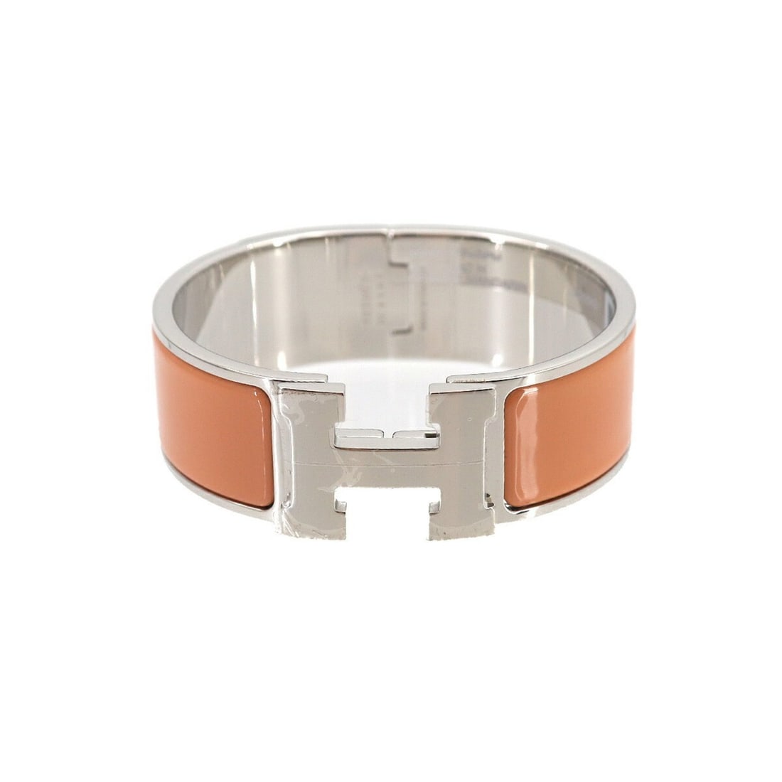Hermes Clic Clac H GM Bangle Orange Mandarin Silver: --- Catalog ---Category: SizeLength: 17cm / 6.69''Category: DesignType: BangleColor: Orange, SilverGender: WomenCategory: GeneralBrand: Hermes--- Item List ---Section: ConditionRanking: Rank NS Never 