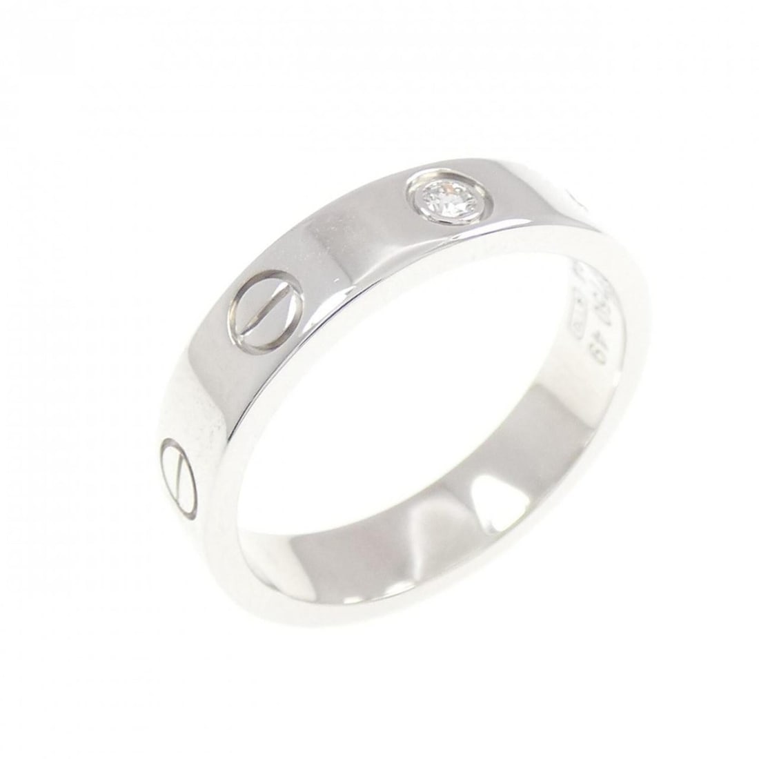 Cartier Mini Love 1P Ring: --- Catalog ---Category: SizeUS Size: 5Brand Size: 49Category: DesignType: Band ringGender: WomenMaterial: White gold (18K)Category: GeneralMPN: B4050500Brand: Cartier--- Item List ---Section: