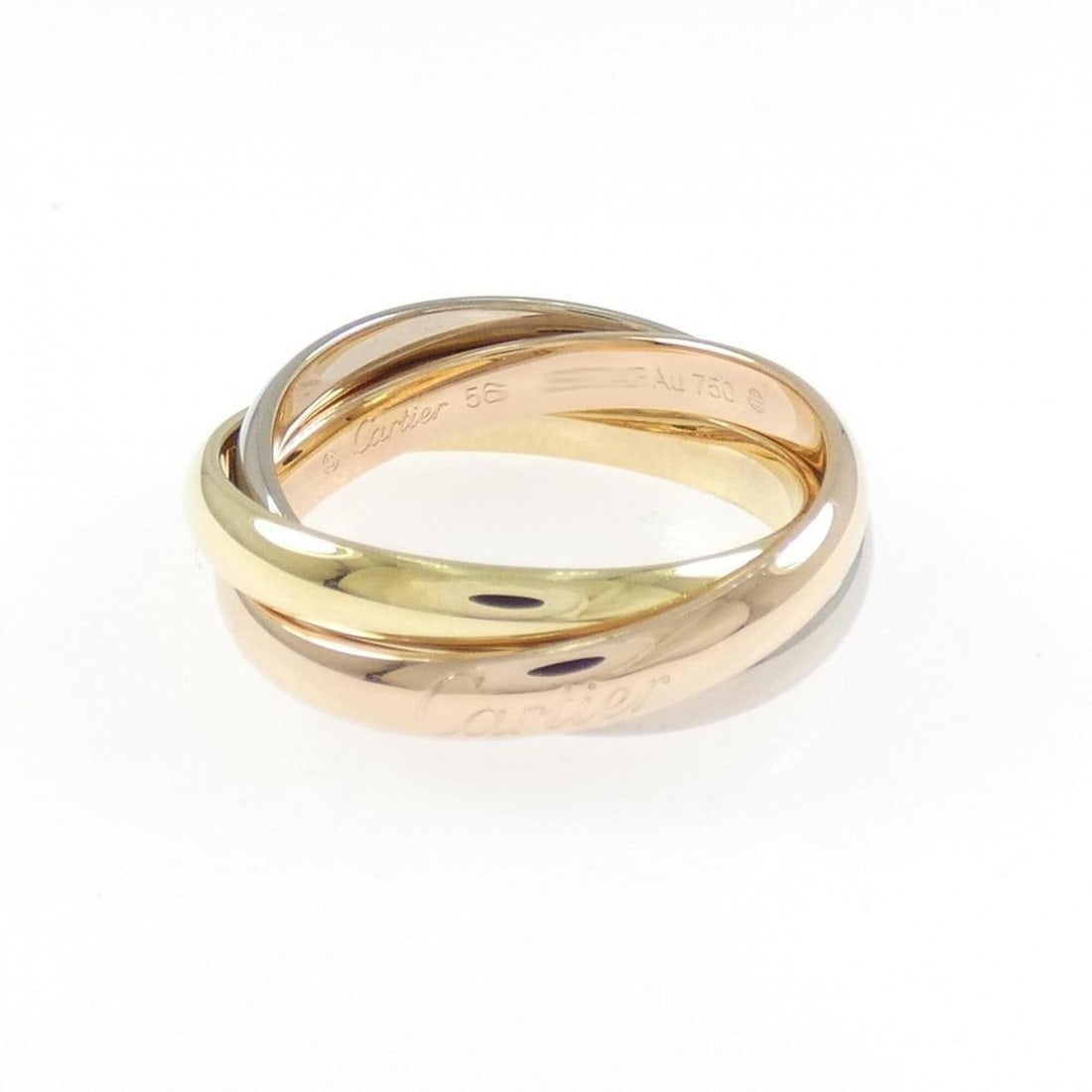 Cartier Trinity Ring: --- Catalog ---Category: SizeUS Size: 8Brand Size: 56Category: DesignType: Band ringGender: Women,MenMaterial: Pink gold (18K), White gold (18K), Yellow gold (18K)Category: GeneralMPN: B4234200Brand: 