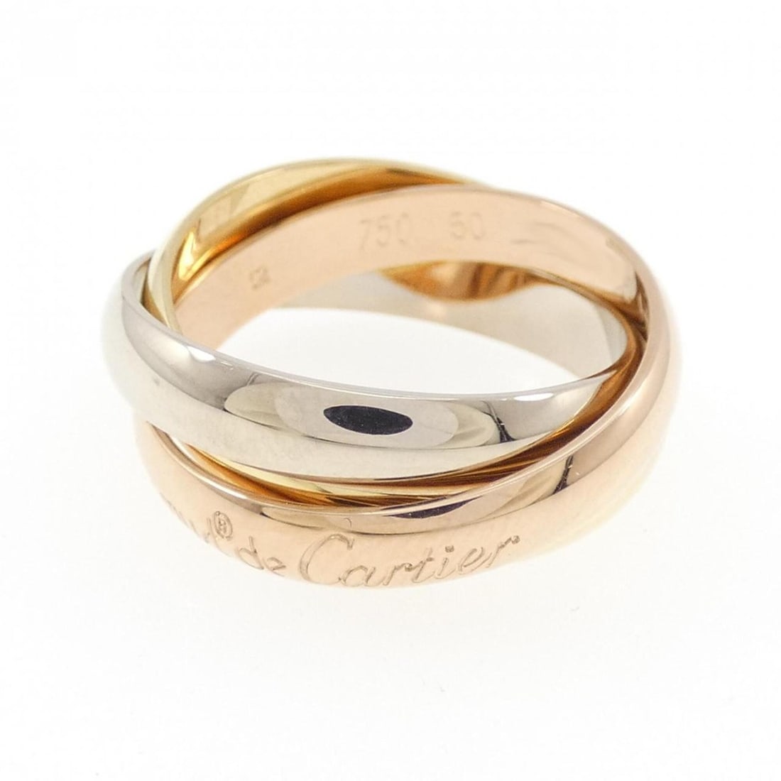 Cartier Trinity Ring: --- Catalog ---Category: SizeUS Size: 5.5Brand Size: 50Category: DesignType: Band ringGender: WomenMaterial: Pink gold (18K), White gold (18K), Yellow gold (18K)Category: GeneralBrand: Cartier---