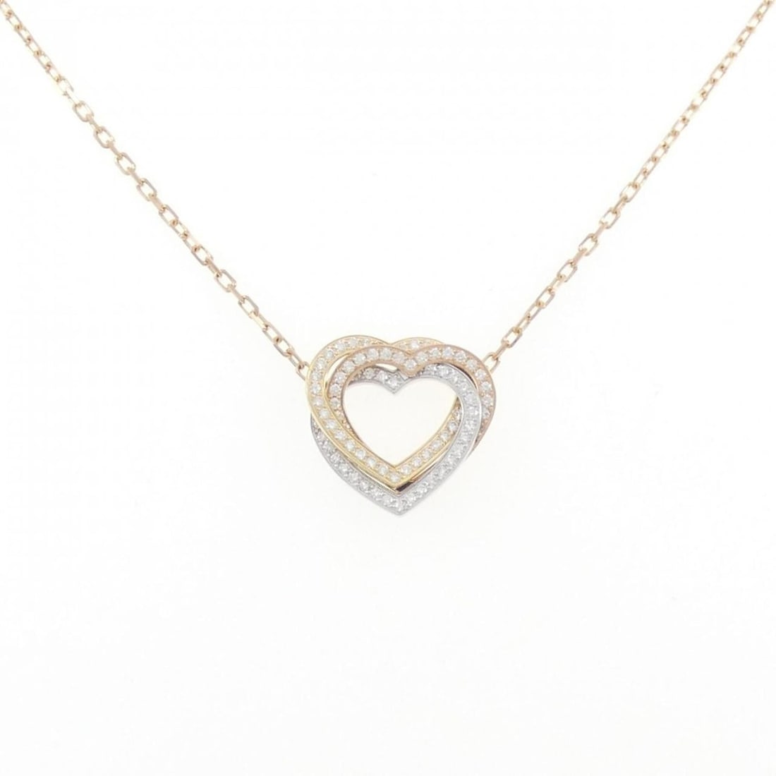 Cartier Trinity Heart Necklace: --- Catalog ---Category: SizePendant Size: 13.9mm x 14.4mm / 0.54'' x 0.56''Neck Circumference: 38 cm - 41 cm / 14.96'' - 16.14''Category: DesignGender: WomenMaterial: Pink gold (18K), White gold