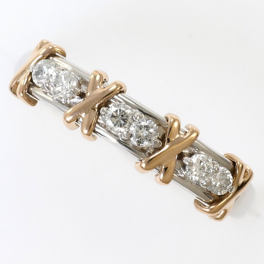 PT900 Platinum 18K Pink Gold Ring, 1 Diamond 0.15ct, Total Weight 2.1g, Like New Condition.: --- Catalog ---Category: SizeWidth: 4mm / 0.16''Weight: 2.1g / 0.07oz.JP Size: 12.5US Size: 6.5Category: DesignType: Band ringColor: Pink gold, PlatinumMetal: Gold, PlatinumStone: DiamondGender: Women