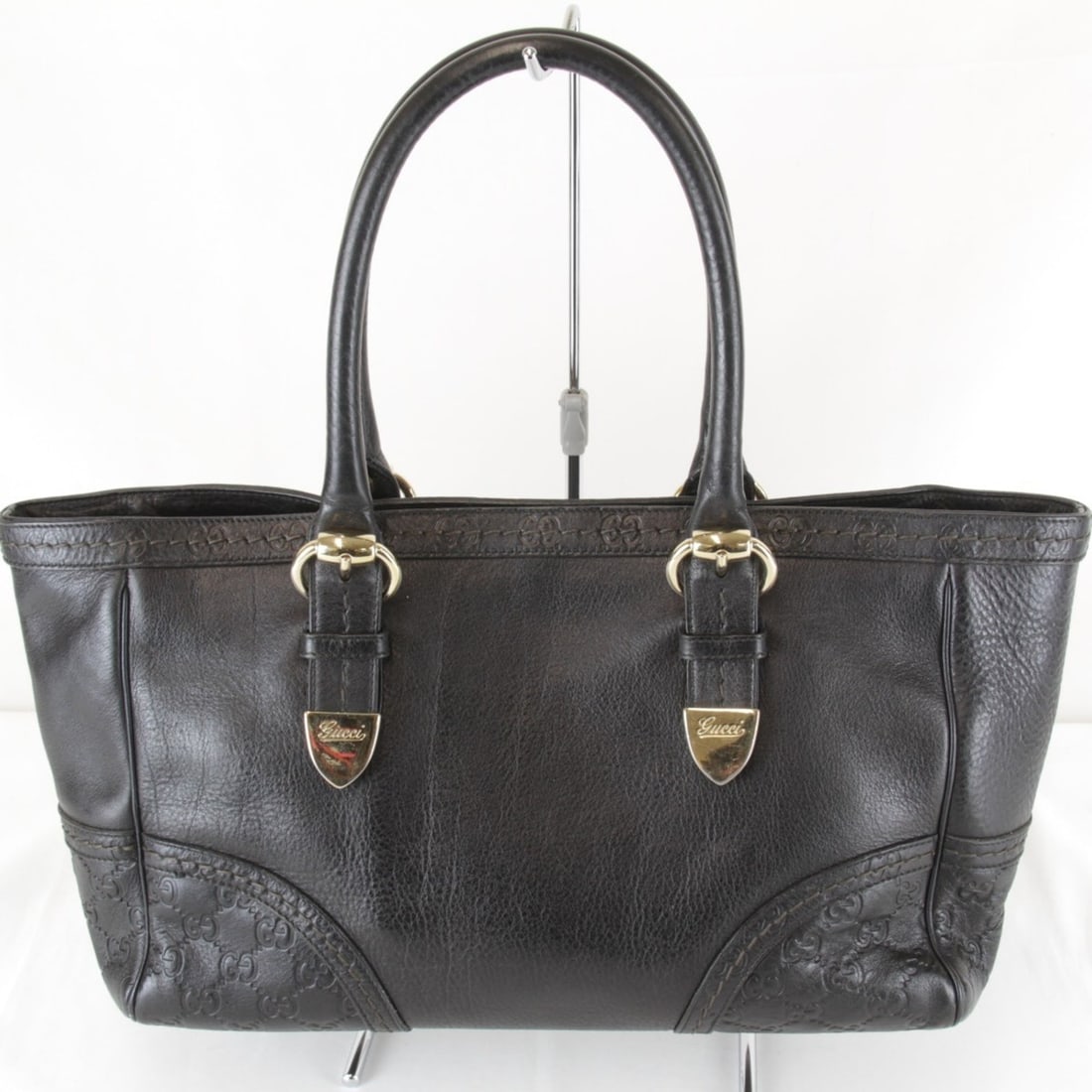 GUCCI Guccissima Black Tote Bag 181511 212792 (Women's) - Leather/Leather: --- Catalog ---Category: SizeWeight: 1.05kg / 2.31lb.Handle Drop: 20.00cm / 7.87''Size (HxWxD): 20cm x 32cm x 12cm / 7.87'' x 12.59'' x 4.72''Handle Length: 46cm / 18.11''Category: DesignType: Tote ba