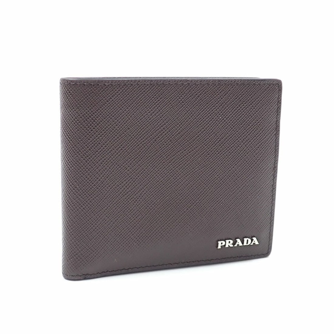 Prada bi-fold wallet for women, dark brown and navy, Saffiano leather.: --- Catalog ---Category: SizeSize (HxWxD): 6.5cm x 11cm x 2.5cm / 2.55'' x 4.33'' x 0.98''Category: DesignType: Wallet (bi-fold)Color: Dark brown, NavyGender: WomenMaterial: Saffiano triangle Category