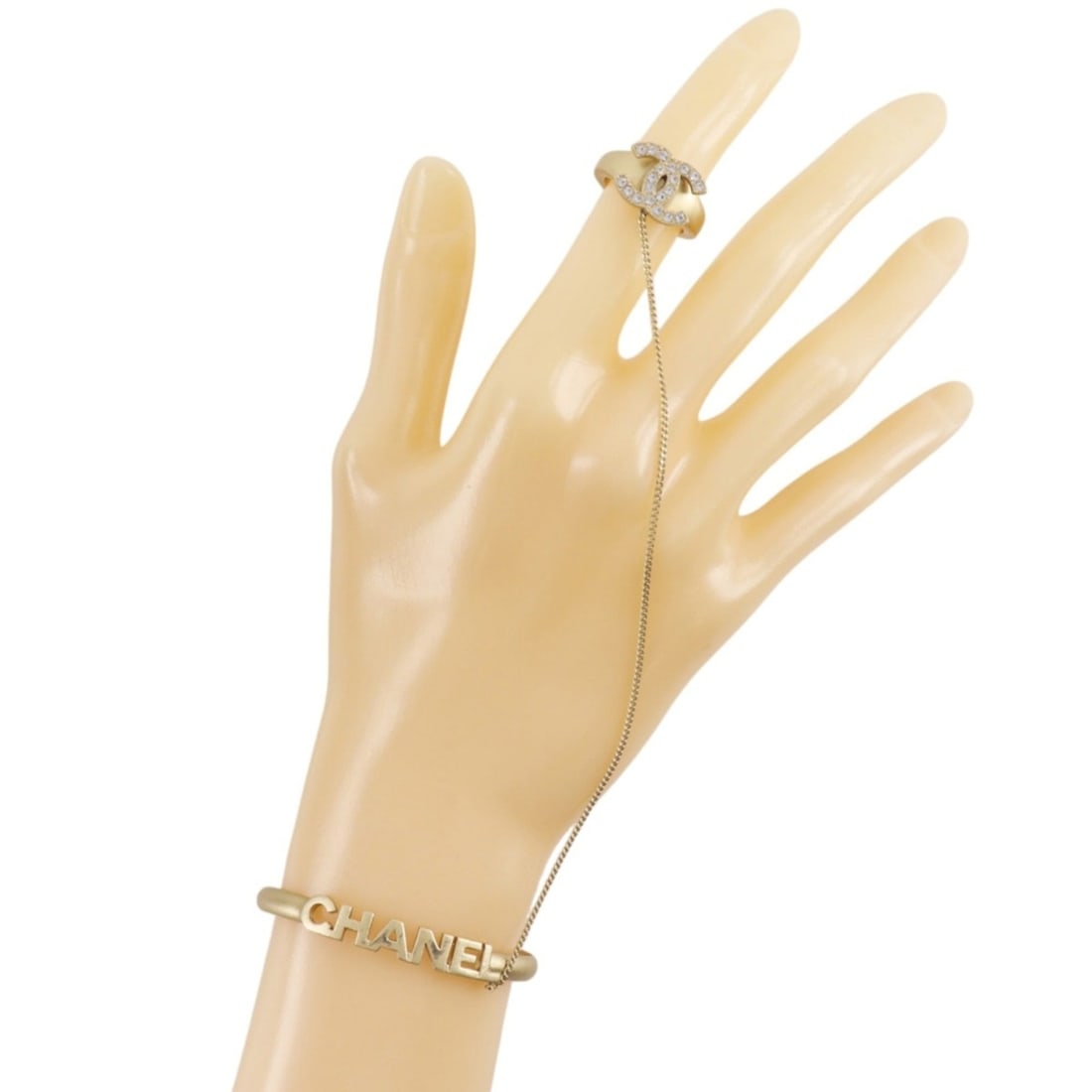 Chanel CHANEL Ring Set Bangle Coco Mark Logo A15613Y02003 Gold Plated x Rhinestone 2001 01C Approx.: --- Catalog ---Category: SizeWeight: 15.2g / 0.53oz.Category: DesignType: Band ringColor: GoldStone: RhinestoneGender: WomenCategory: GeneralBrand: Chanel--- Item List ---Section: ConditionRanking: Ra