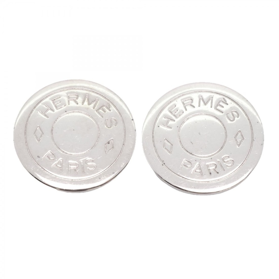 Hermes Earrings, Sellier Metal Silver, Women's, P2984557: --- Catalog ---Category: SizeSize (HxWxD): 20.20mm x 20.10mm / 0.80'' x 0.79''Category: DesignType: Clip earringsColor: SilverGender: WomenMaterial: MetalCategory: GeneralBrand: Hermes--- Item List --